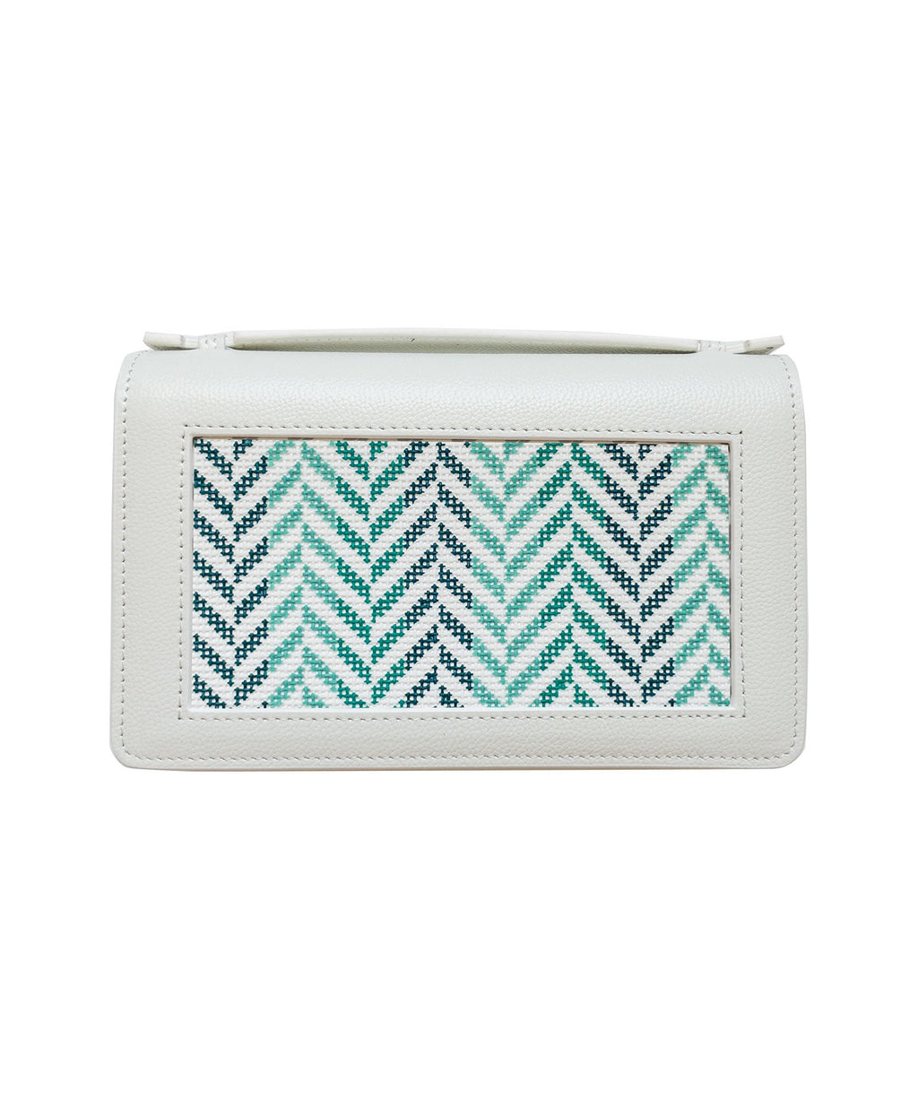 Mini Herringbone clutch in turquoise, finished example of the Initial K Studio needlepoint canvas